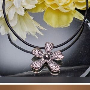 Silver or flower charm